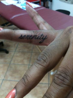 Finger Text Tattoo